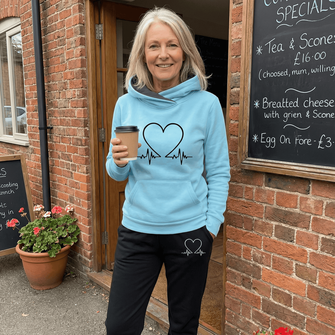 Stylish women's two-piece tracksuit in soft, comfortable fabric, perfect for lounging or light jogging.