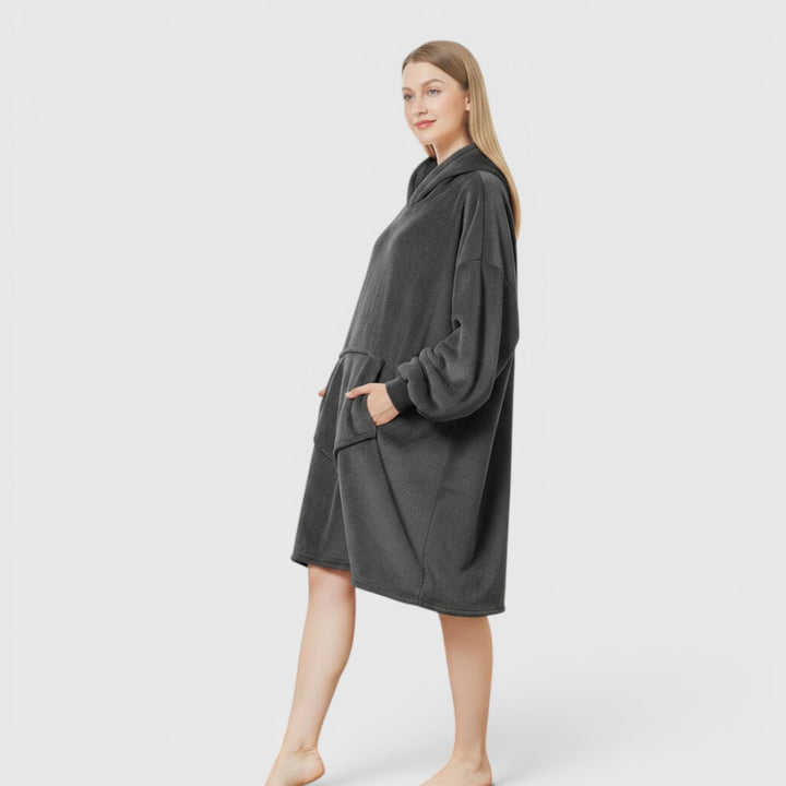 Stay warm in this women's ultra soft hoodie blanket. Cozy wearable comfort for winter days.