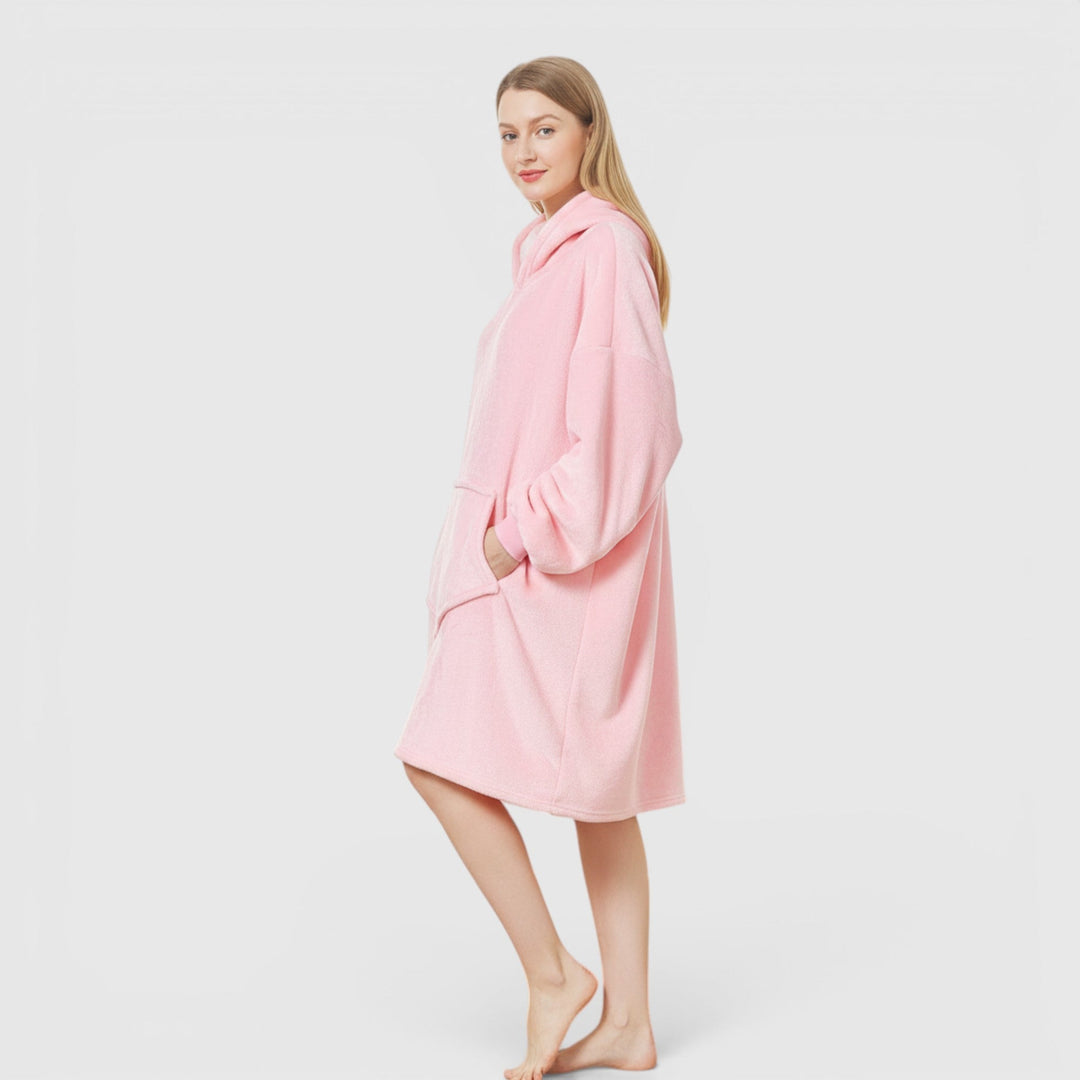 Soft women's hoodie blanket, a cozy wearable gift idea for ultimate relaxation & warmth.