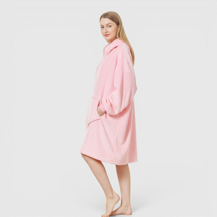 Soft women's hoodie blanket, a cozy wearable gift idea for ultimate relaxation & warmth.