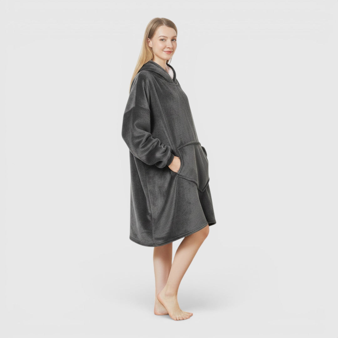 Cozy women's oversized hoodie blanket. Ultra soft wearable comfort for relaxing & winter warmth.