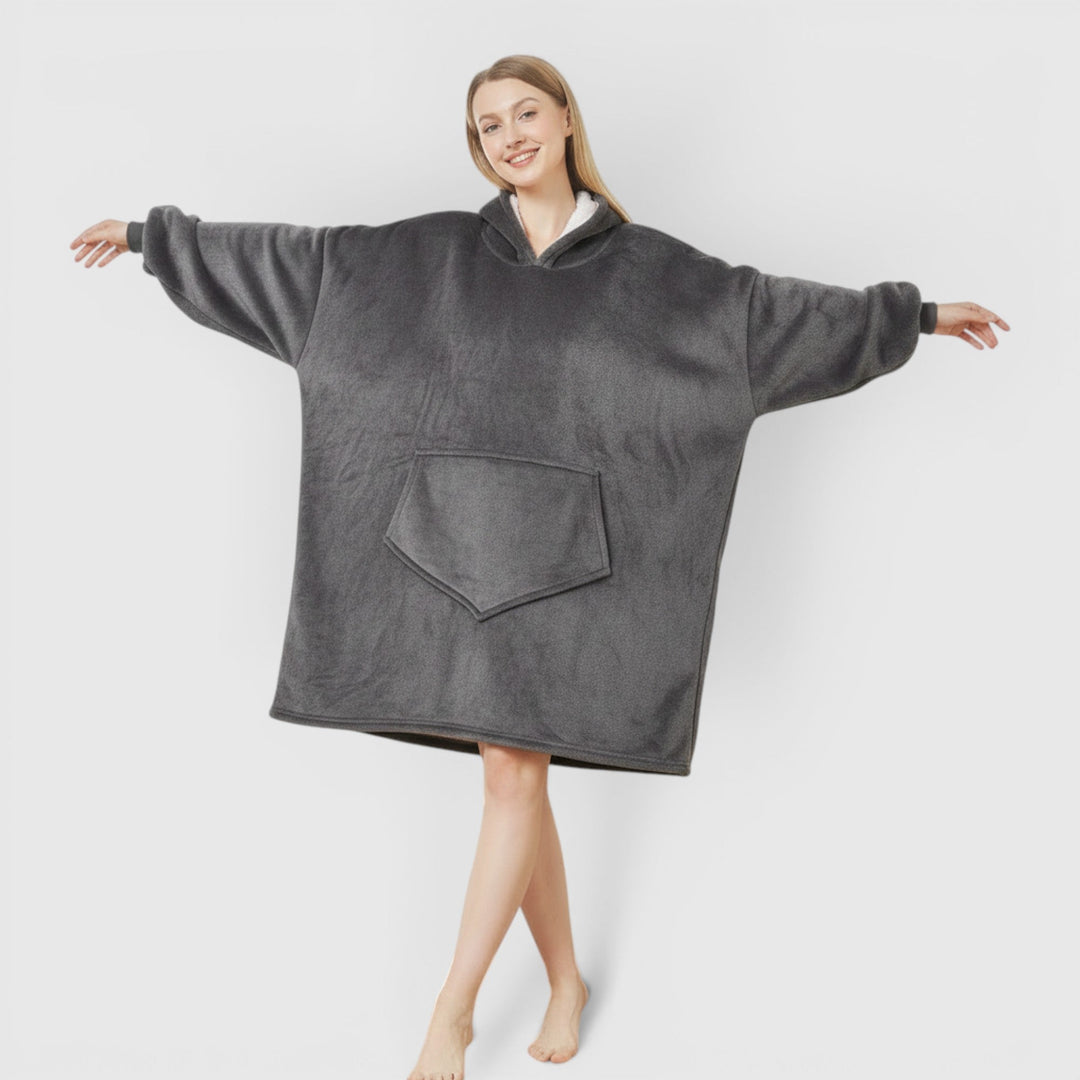 Luxuriously soft women's wearable hoodie blanket. Enjoy cozy comfort and warmth for lounging.