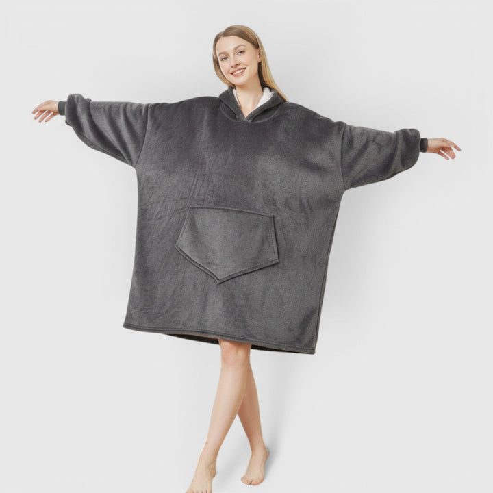 Luxuriously soft women's wearable hoodie blanket. Enjoy cozy comfort and warmth for lounging.
