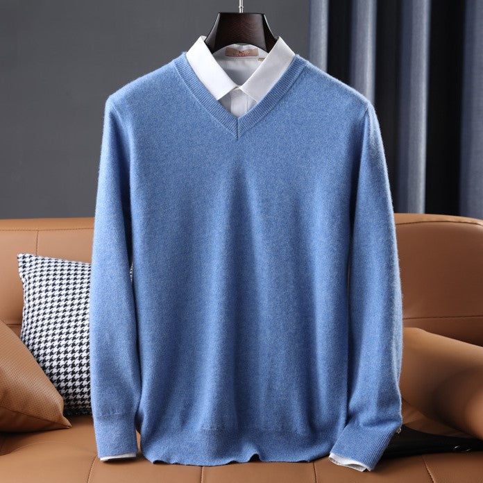 Elegant women's knitwear: a soft v-neck pullover sweater with long sleeves, offering warmth and style.