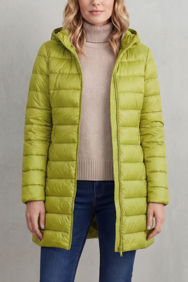 Women's hooded puffer jacket, packable & cozy. Great warm outerwear for winter fashion on the go.