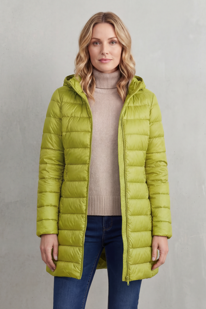 Lightweight women's fall jacket, hooded puffer style. Ultra-warm for outdoor activities & travel.