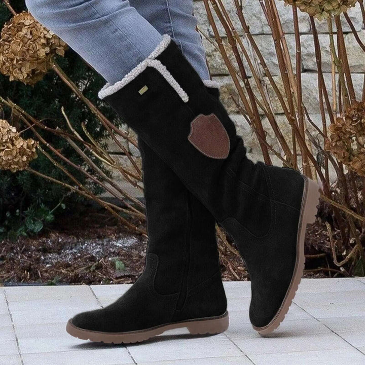 Stylish women's insulated winter fashion boots with faux fur lining. Slip-resistant for snow & cold weather.