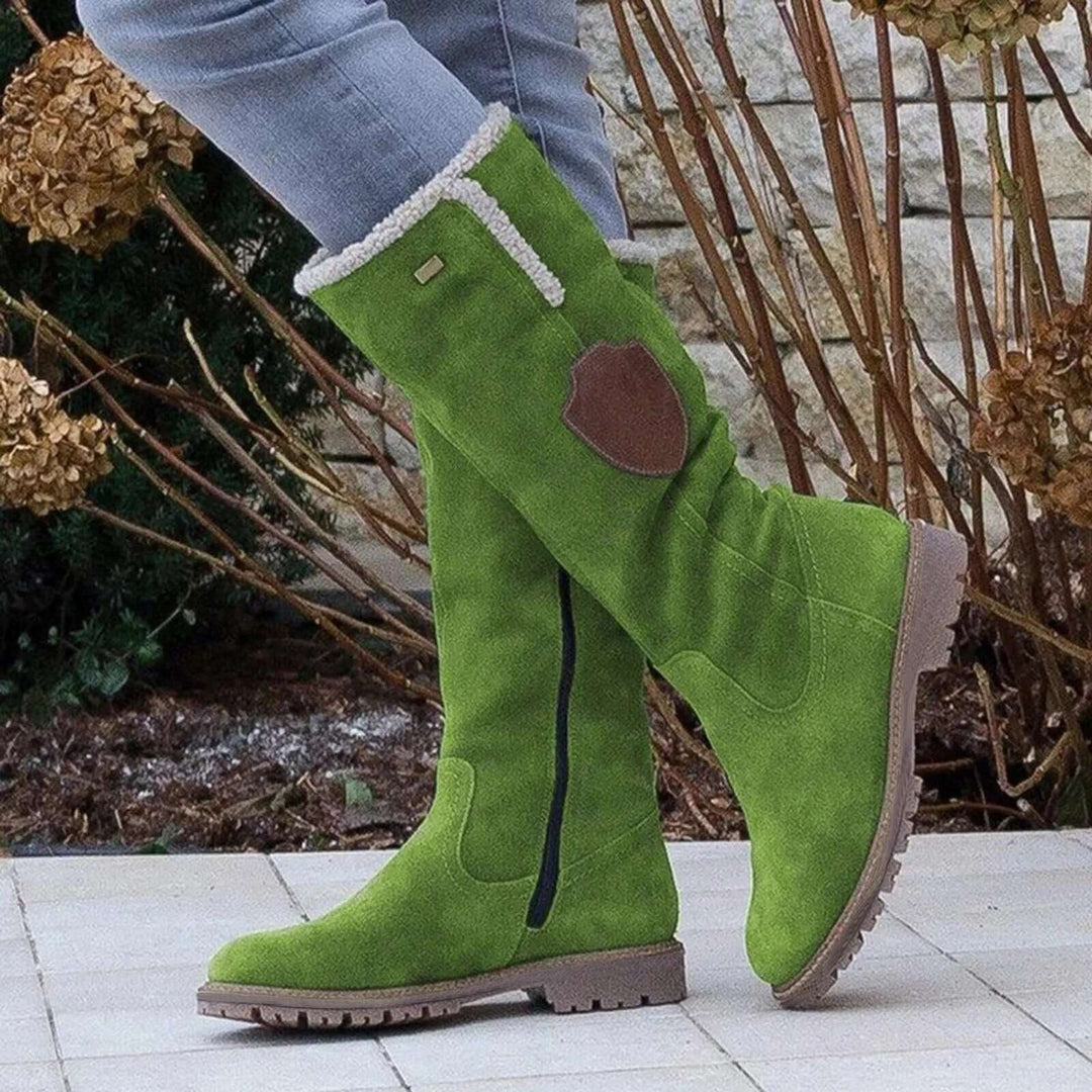 Durable women's outdoor winter boots with thick insulation & rugged slip-resistant tread for snow & ice.