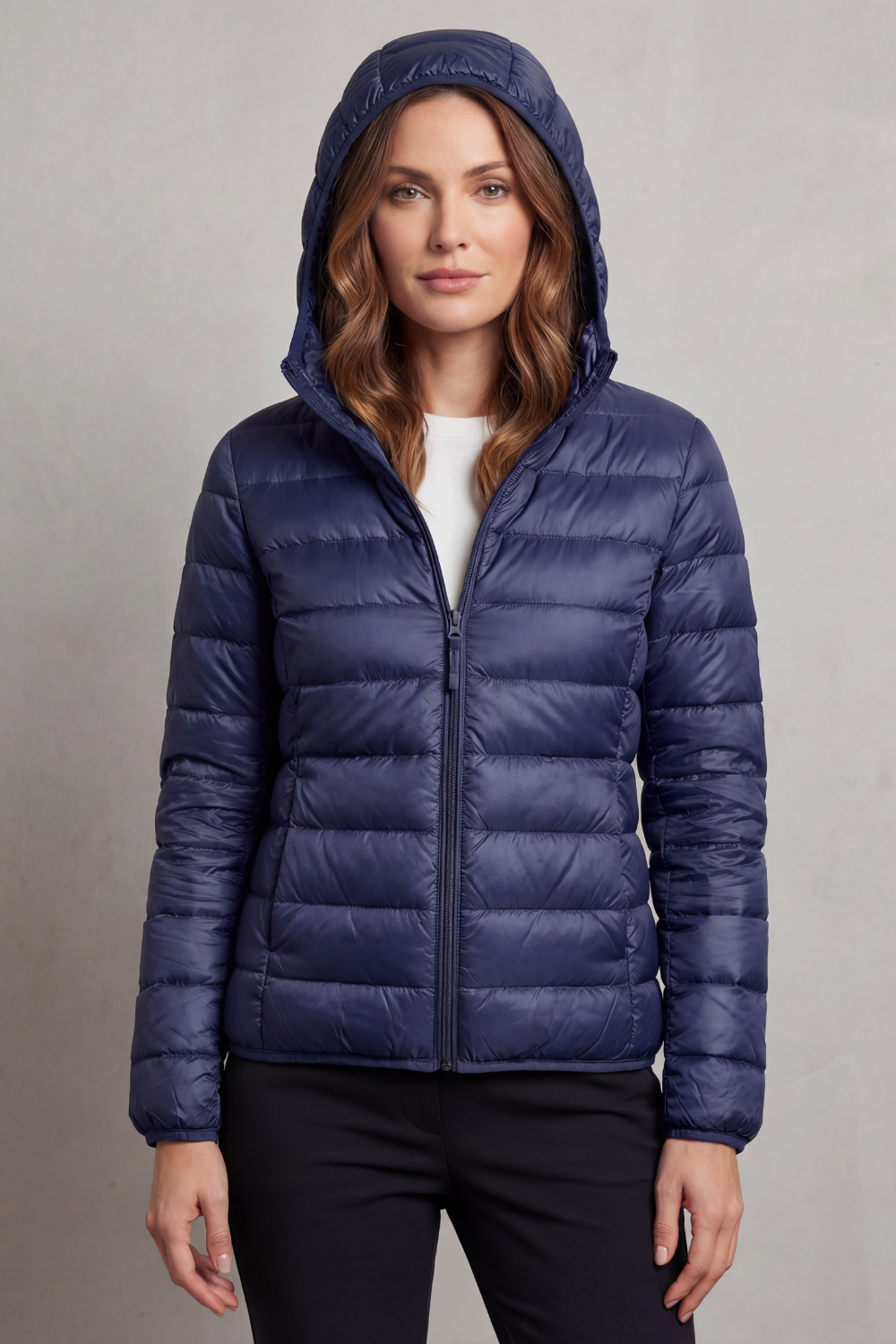 Women's fashionable ultralight packable puffer jacket, hooded for added warmth and style.
