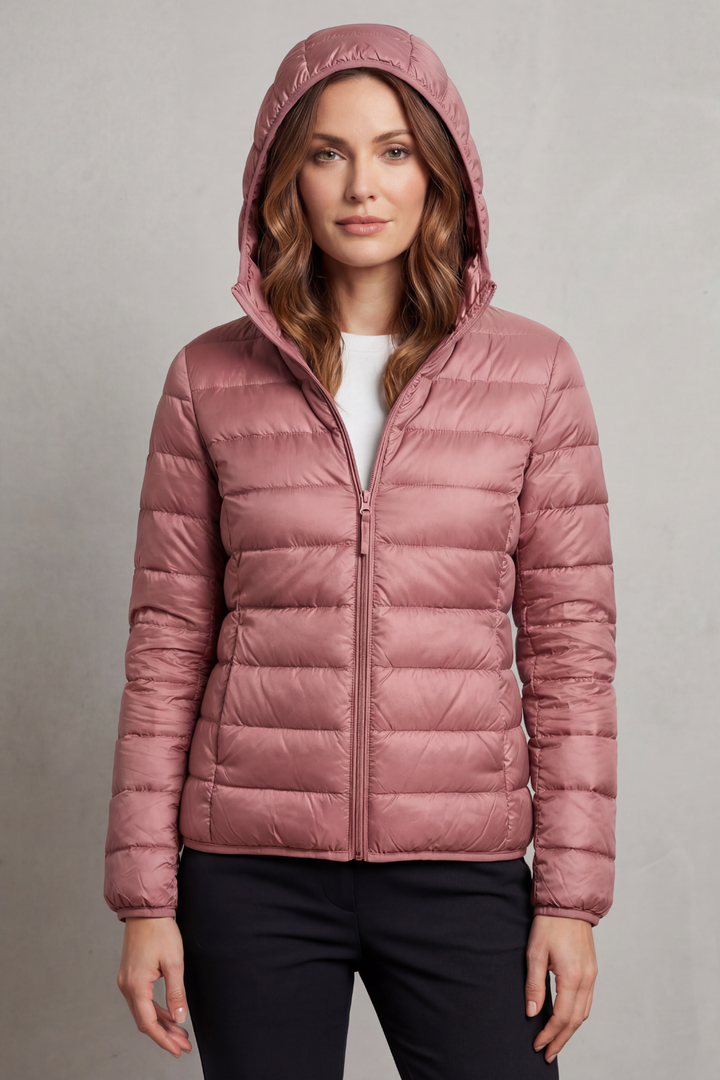 Women's chic ultralight hooded puffer jacket, packable for effortless style & travel.