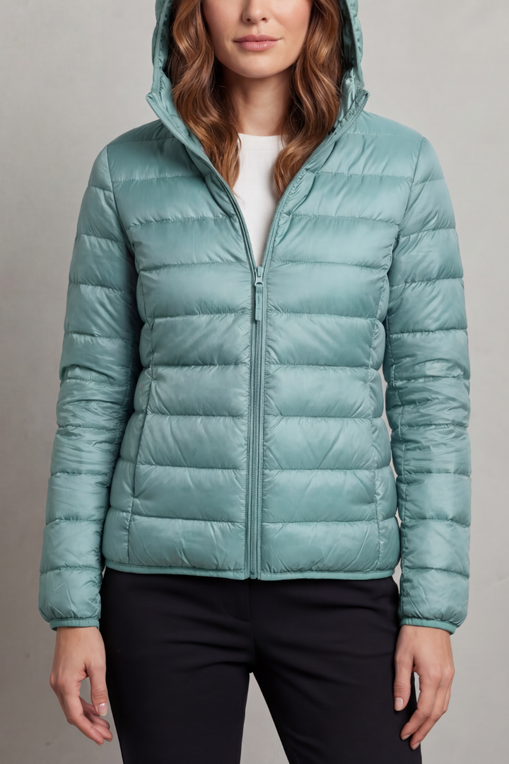 Women's go-to ultralight packable hooded puffer, versatile lightweight outerwear for any season.