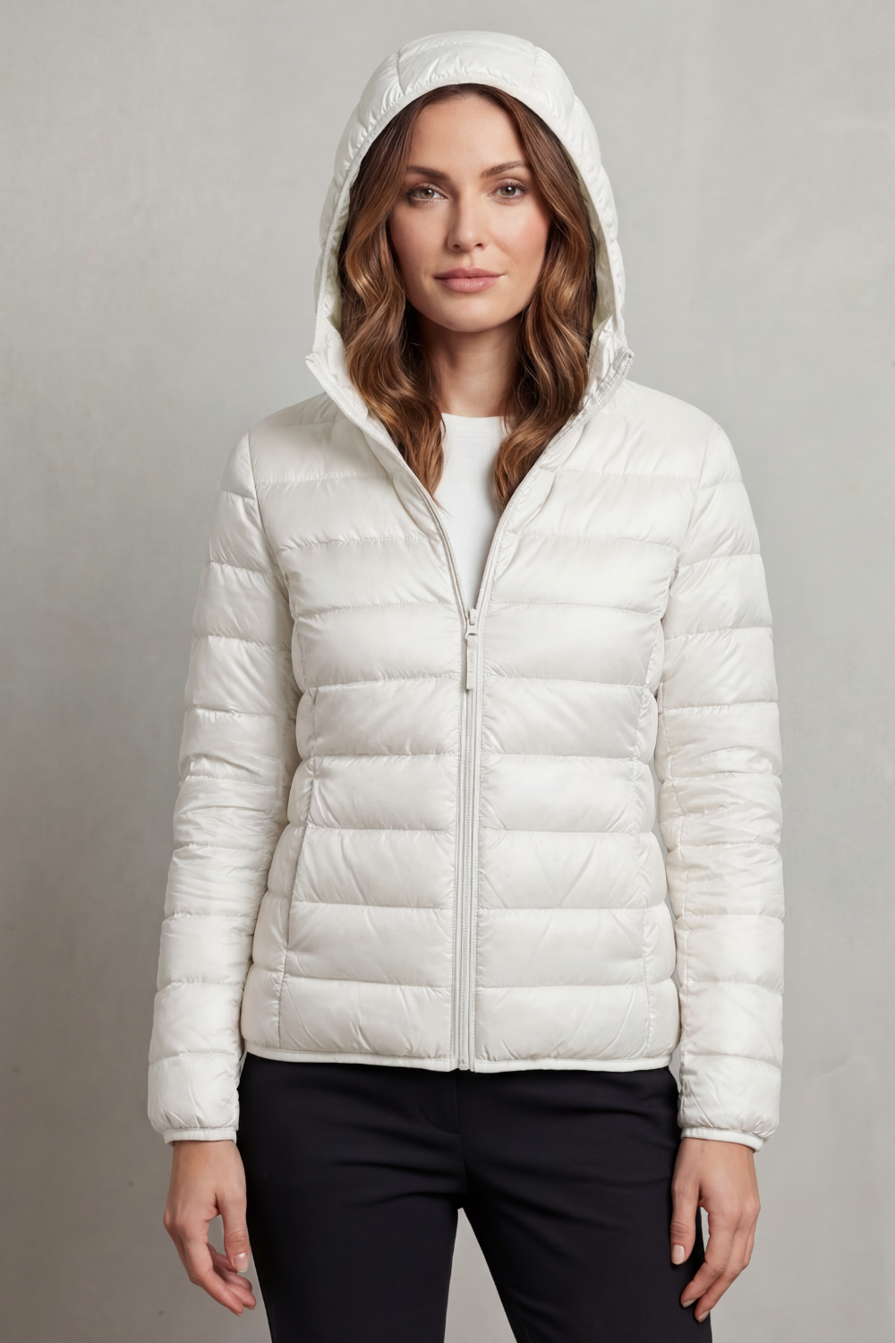 Women's travel-ready ultralight hooded puffer jacket, packable for all your journeys.