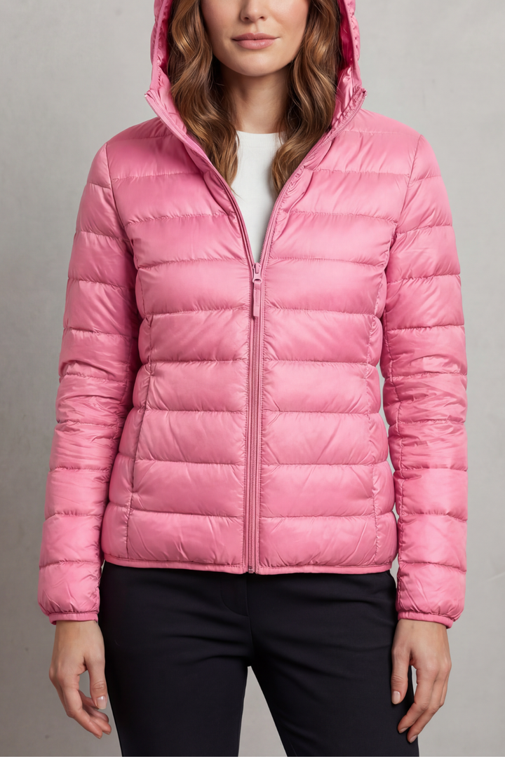 Women's versatile ultralight packable hooded puffer, designed for comfort and mobility.