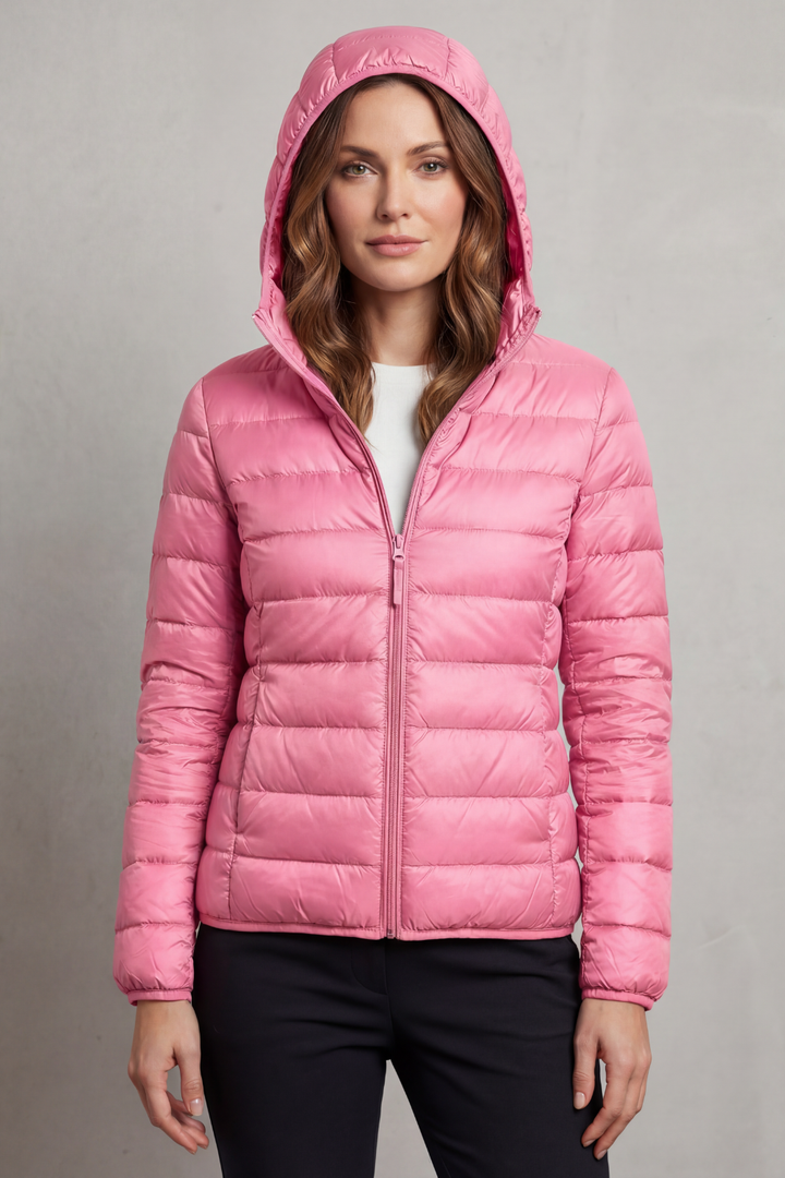 Women's year-round ultralight hooded puffer jacket, packable for spontaneous adventures.