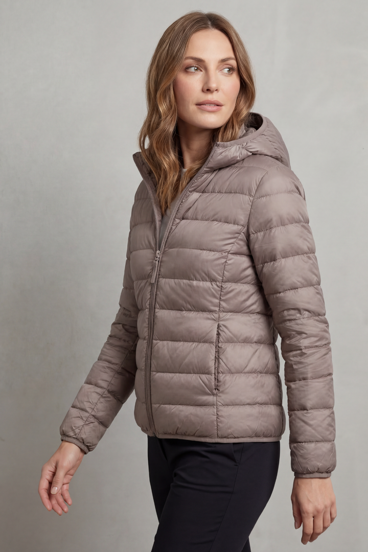 Stylish women's hooded puffer jacket, ultralight and packable for spring, fall, and mild winter.