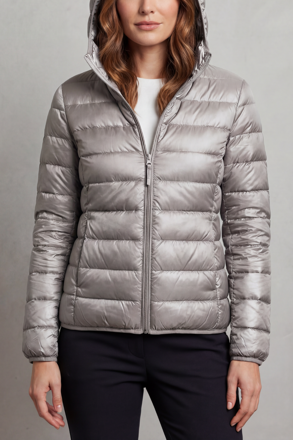 Packable women's hooded puffer jacket, ultralight outerwear for spring, fall, and everyday comfort.