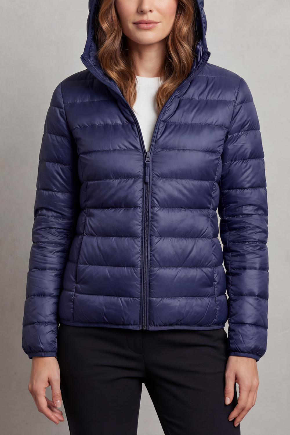 Versatile women's ultralight hooded puffer, packable for travel & year-round lightweight outerwear.