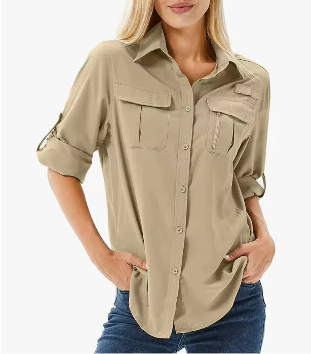 Women's adventure UPF 50 long sleeve shirt with roll-up tabs and zip pockets for ultimate sun safety.