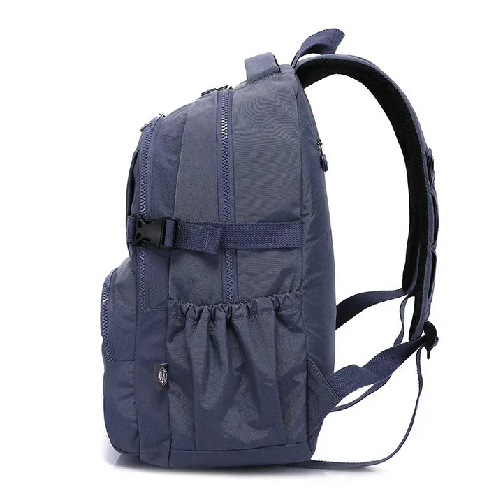 Urban women's nylon commuter backpack, water-resistant for laptops & essentials.