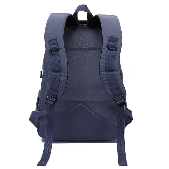 Women's stylish backpack, water-resistant nylon, durable for travel & daily use.