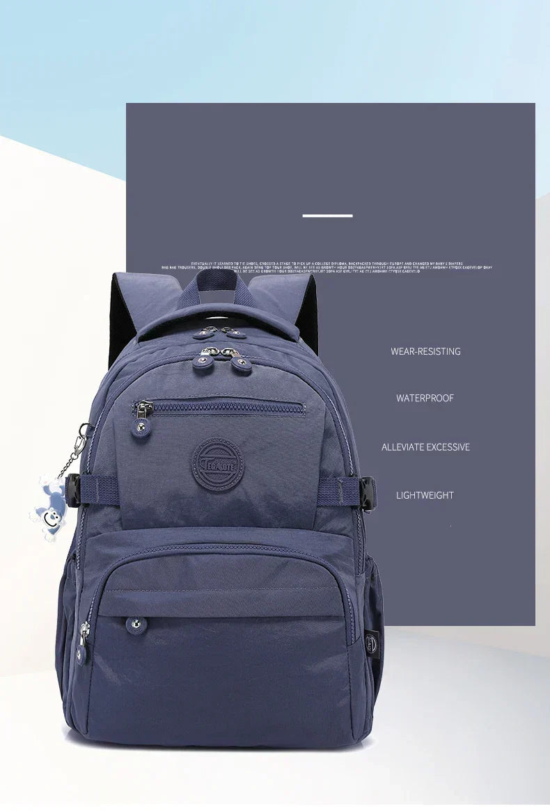 Black nylon women's backpack, water-resistant, perfect for urban daily commuting.