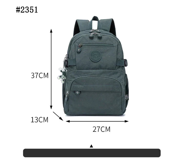 Stylish women's commuter nylon backpack, water-resistant for all weather travel.