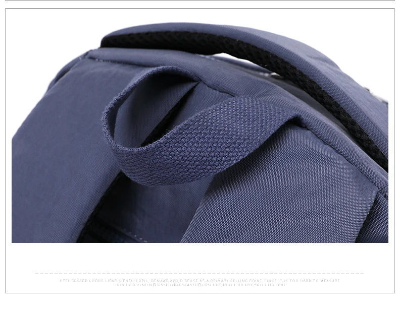 Stylish women's school & work backpack, water-resistant nylon, ideal for organized urban life.