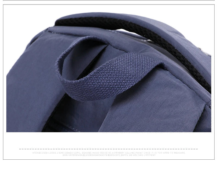 Stylish women's school & work backpack, water-resistant nylon, ideal for organized urban life.