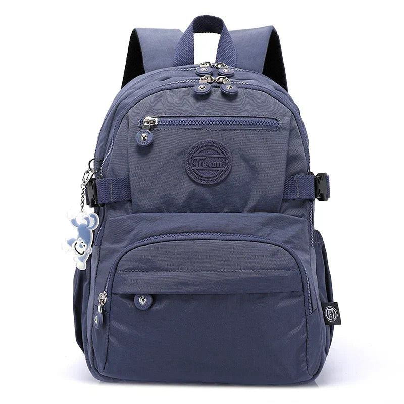 Everyday women's school backpack, durable nylon, water-resistant for books & laptop.