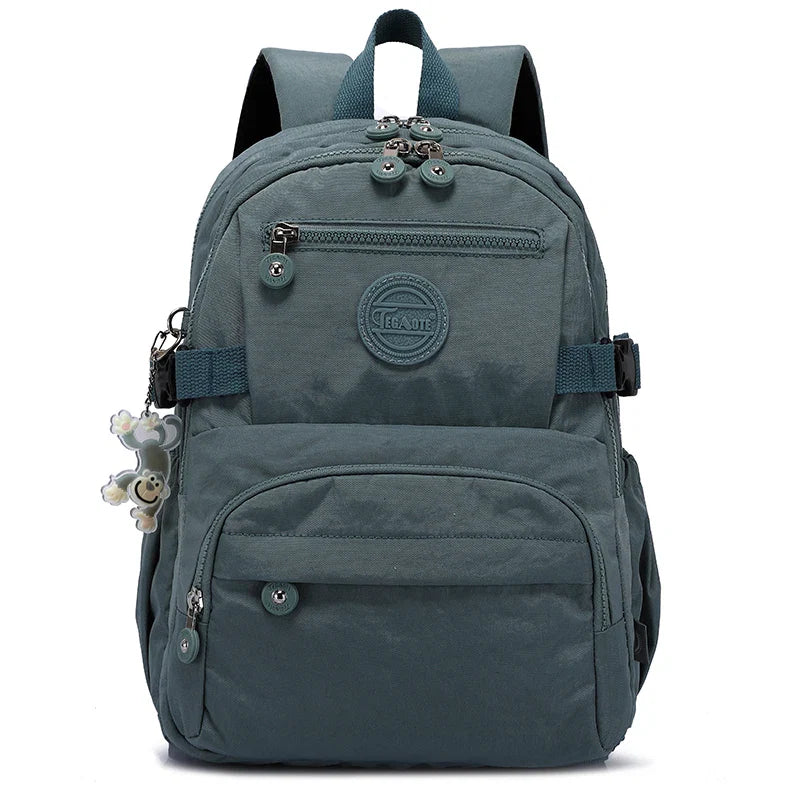 Stylish women's travel nylon backpack, water-resistant, perfect for city adventures.