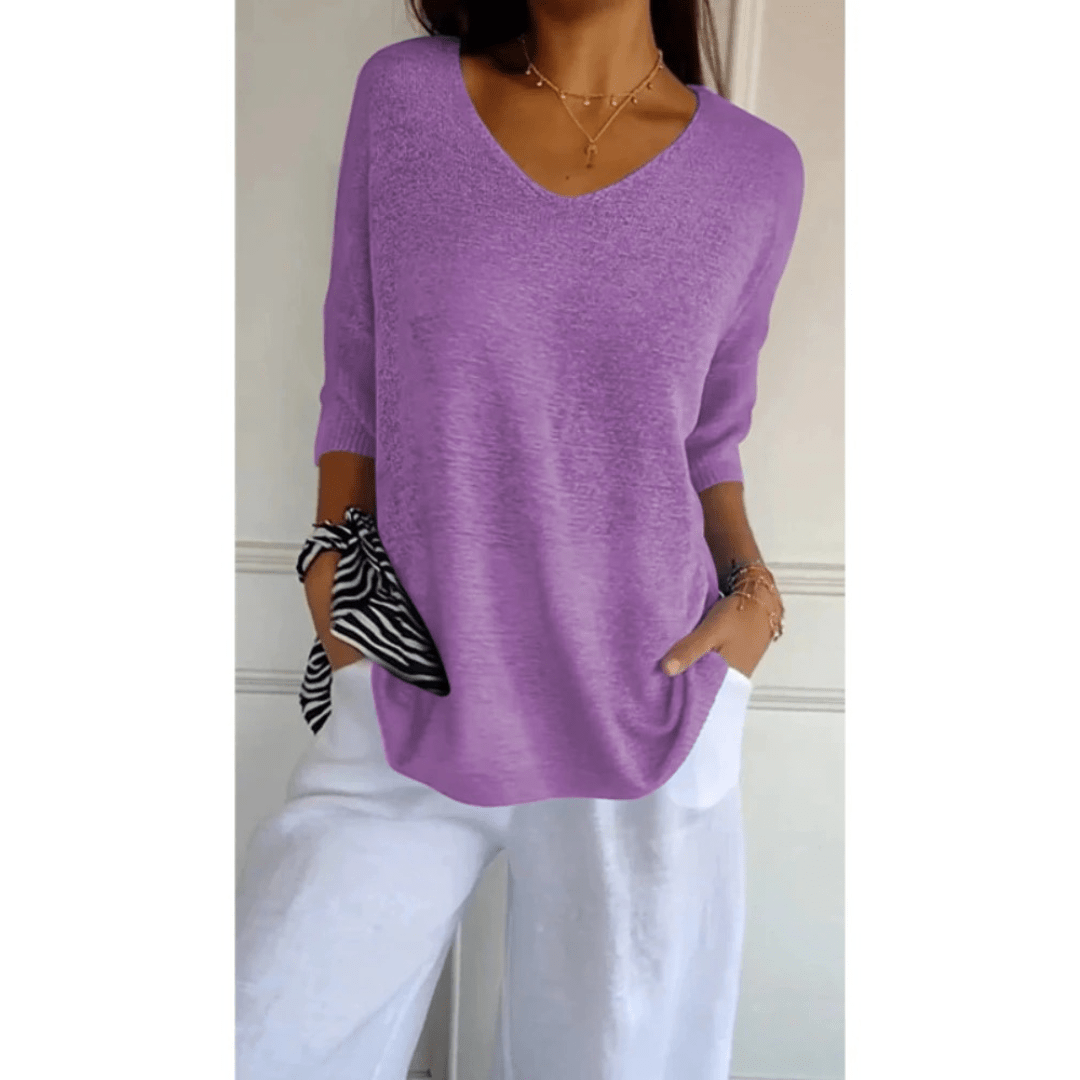 Soft women's V-neck top, 3/4 sleeves. Ideal for relaxed fit & comfortable everyday wear.