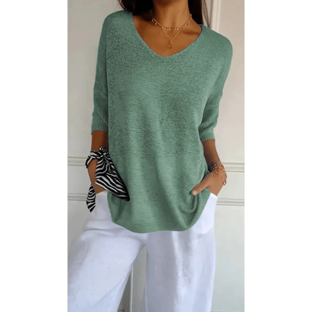 Simple yet chic women's V-neck top. 3/4 sleeves make it perfect for comfortable spring fashion.