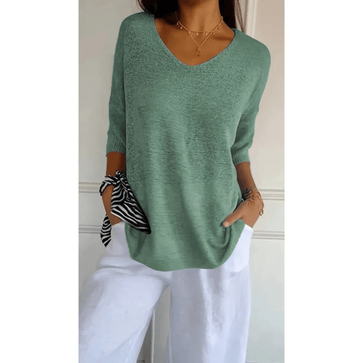 Simple yet chic women's V-neck top. 3/4 sleeves make it perfect for comfortable spring fashion.