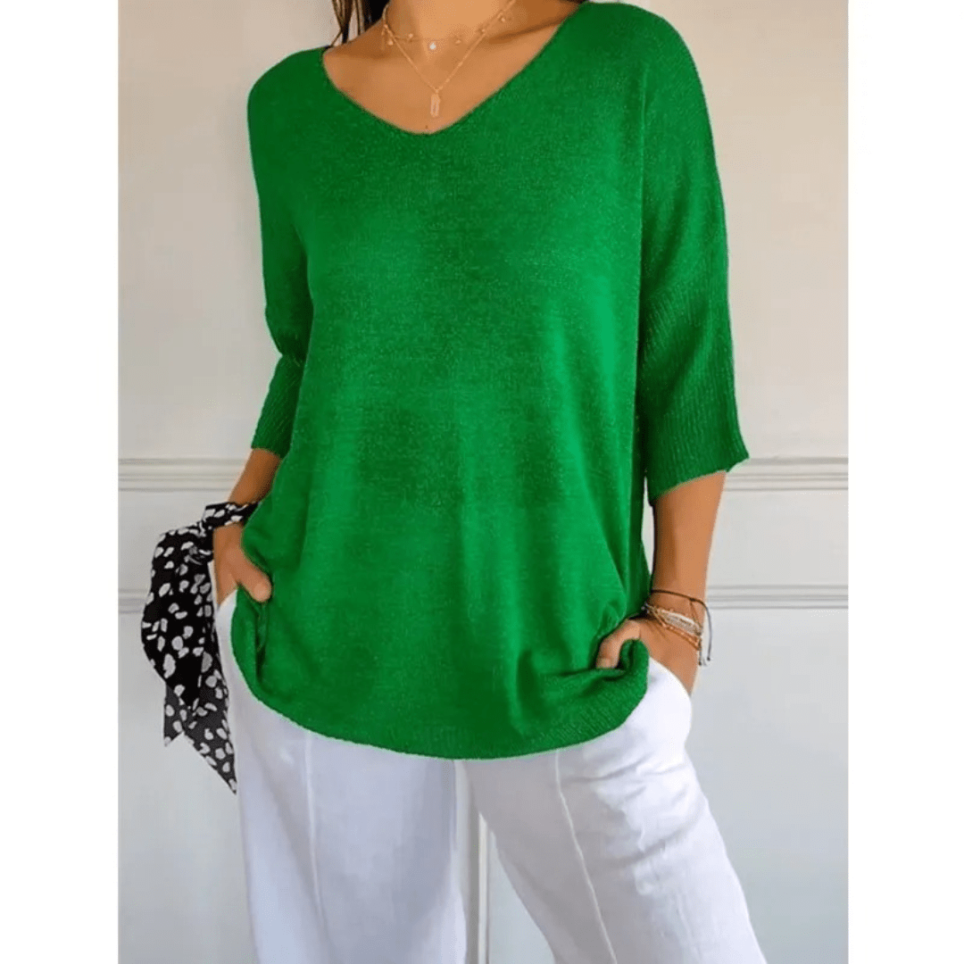 Comfortable women's V-neck 3/4 sleeve top, great for versatile casual everyday fashion.