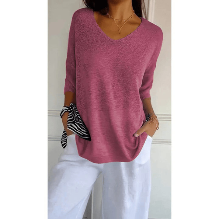 Versatile women's 3/4 sleeve V-neck top. Great for casual comfort & everyday styling.