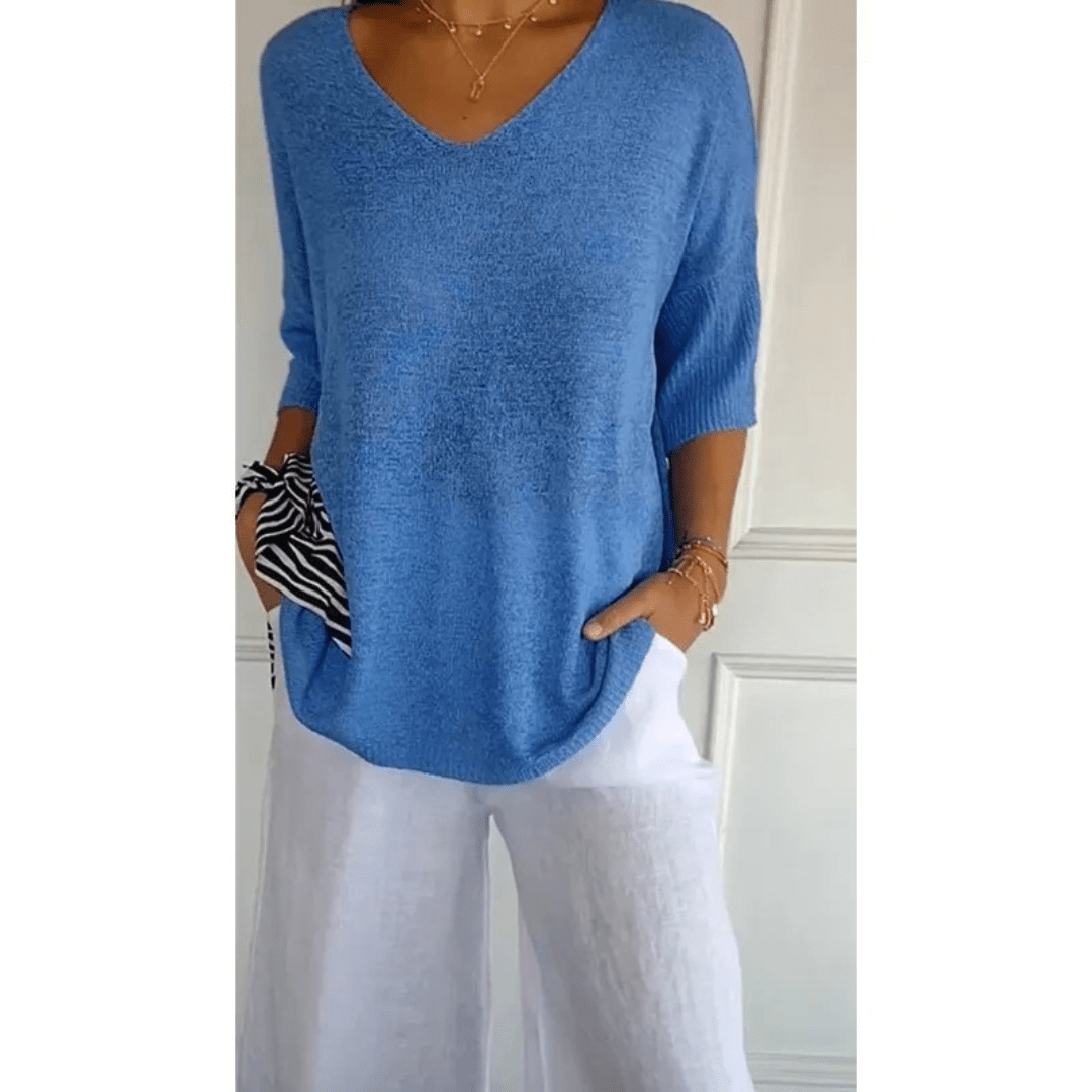 Effortless women's V-neck 3/4 sleeve top. Perfect casual blouse for versatile styling.