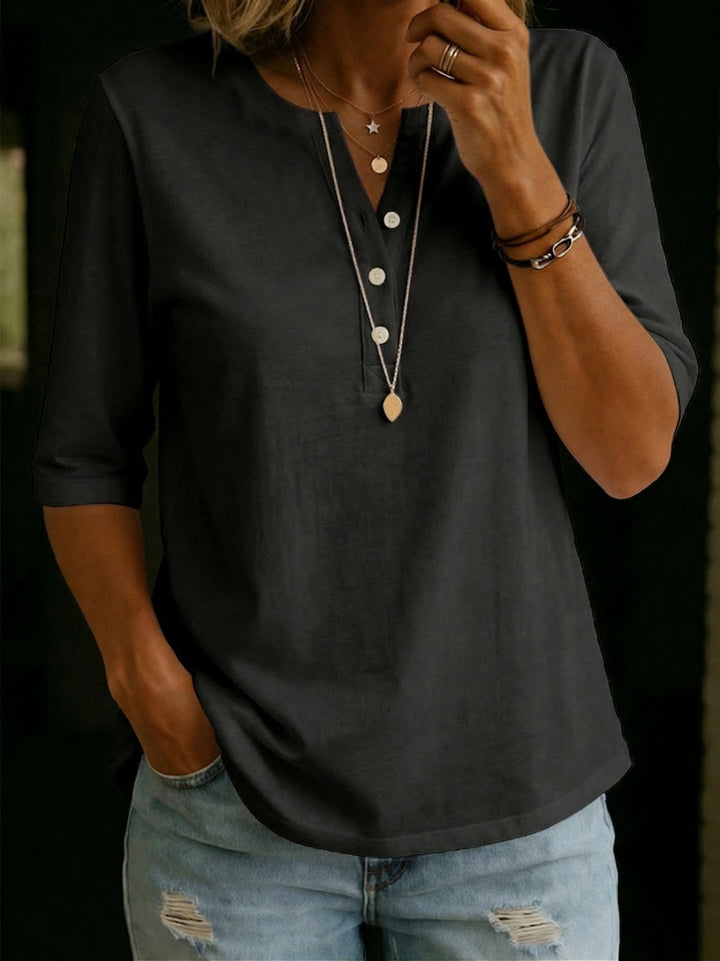 Versatile women's V-neck top, relaxed fit, 3/4 sleeves. Ideal for spring fashion & summer style.