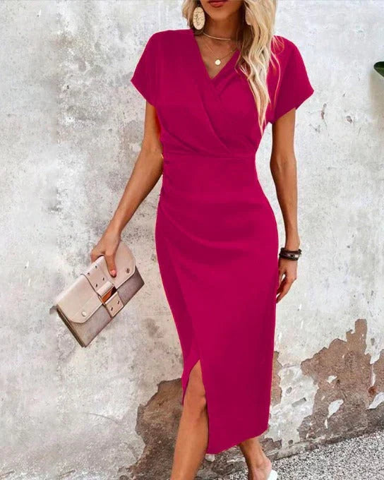 Women's sophisticated V-neck bodycon midi dress featuring an elegant front split, perfect for glamorous events.