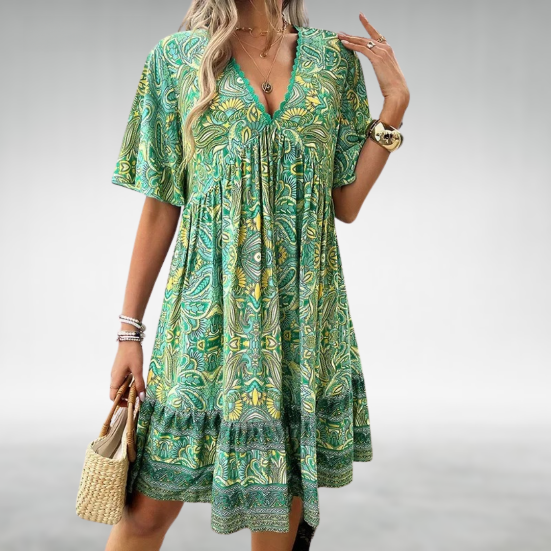 Women's V-neck bohemian summer dress with a vibrant ethnic print, perfect for beach vacations & festivals.