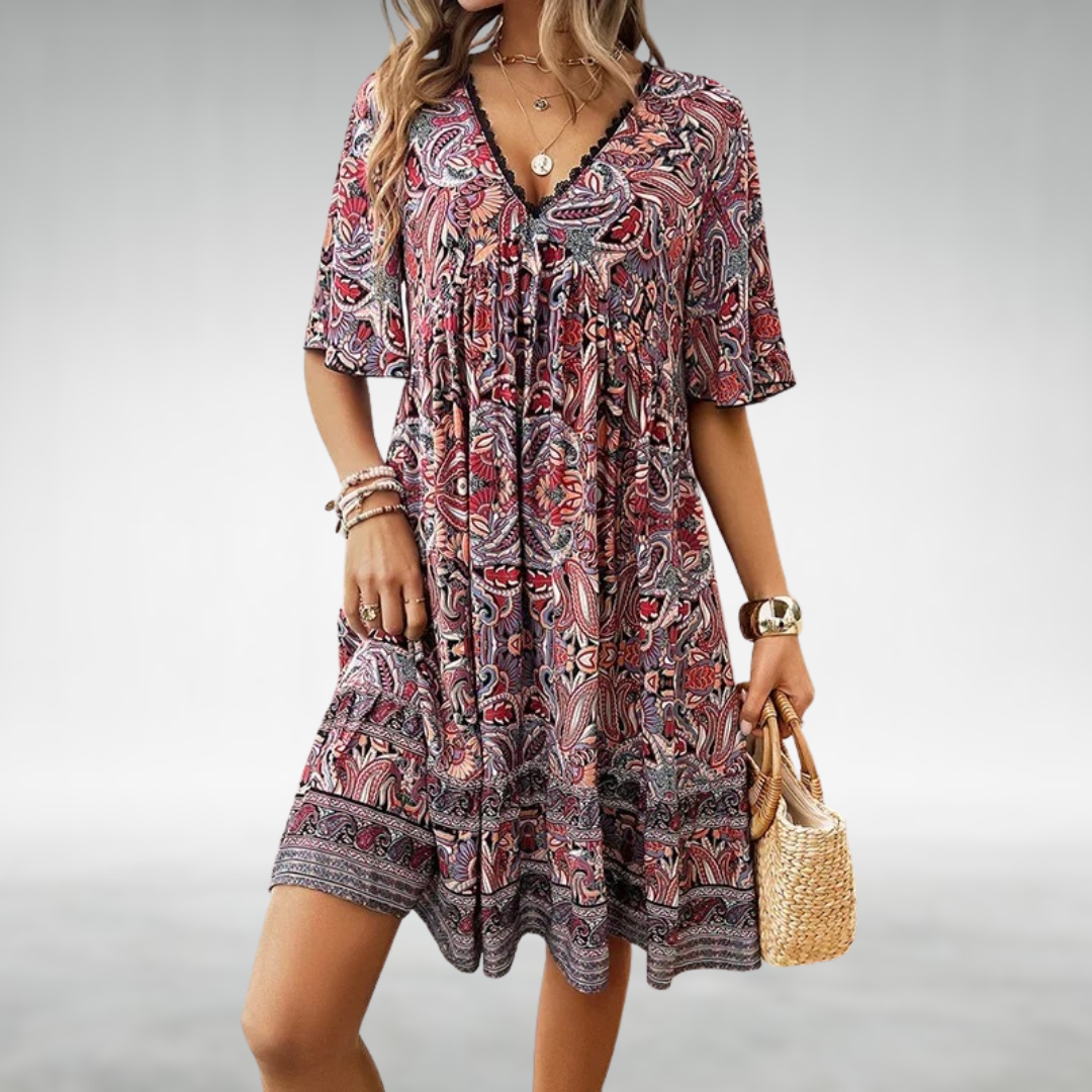 Vibrant women's summer bohemian dress with a relaxed fit & flowing fabric, great for festivals or vacation.