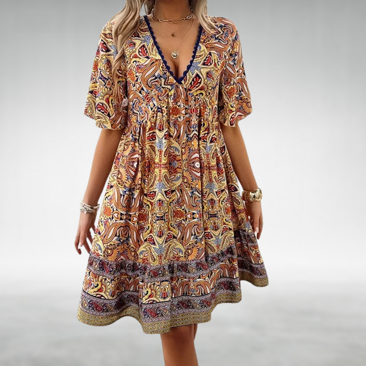 Stylish women's bohemian v-neck dress, perfect as a flowy beach cover-up or a comfortable summer festival outfit.