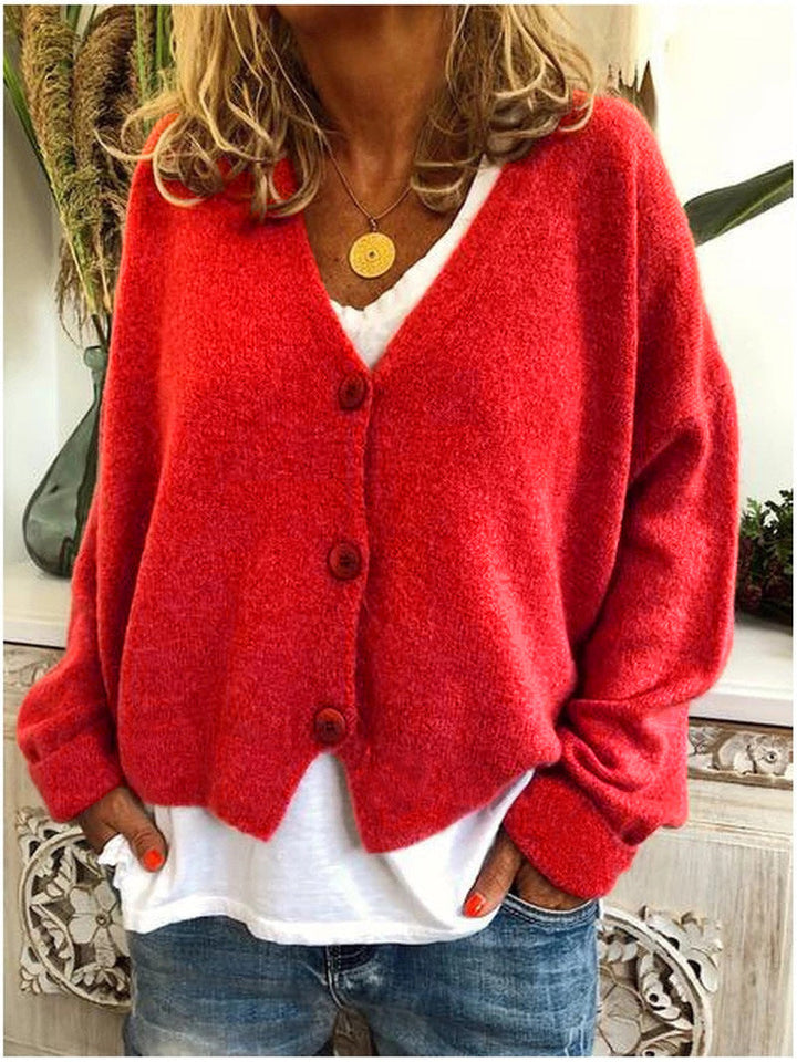 Essential women's V-neck button-up cardigan in a soft knit, perfect for transitional weather.