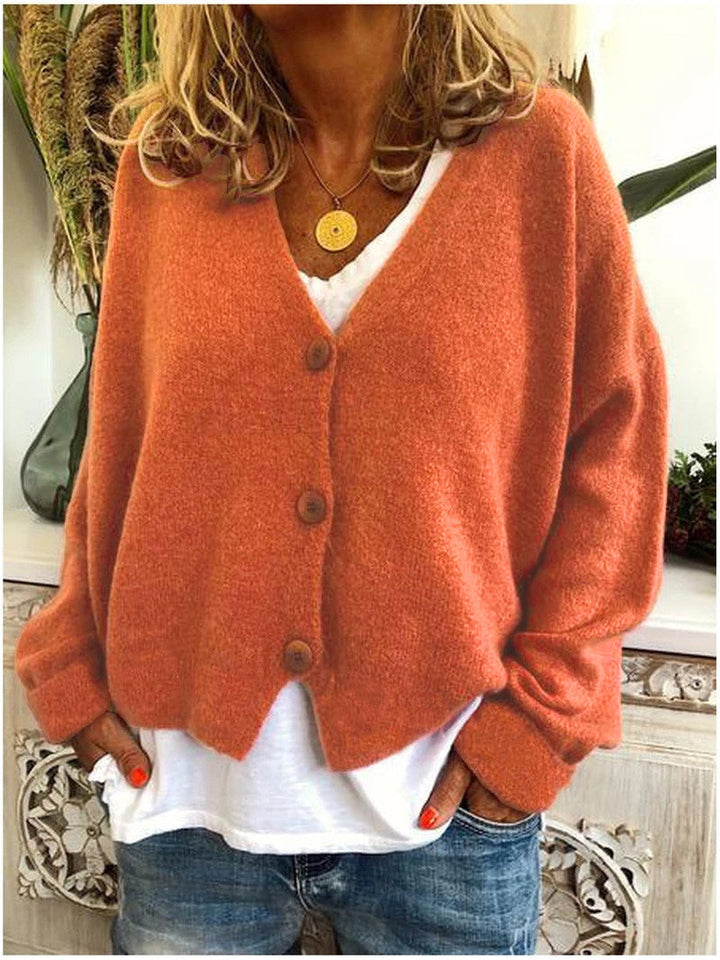 Cozy women's V-neck cardigan with functional buttons, ideal for fall & spring outfits.