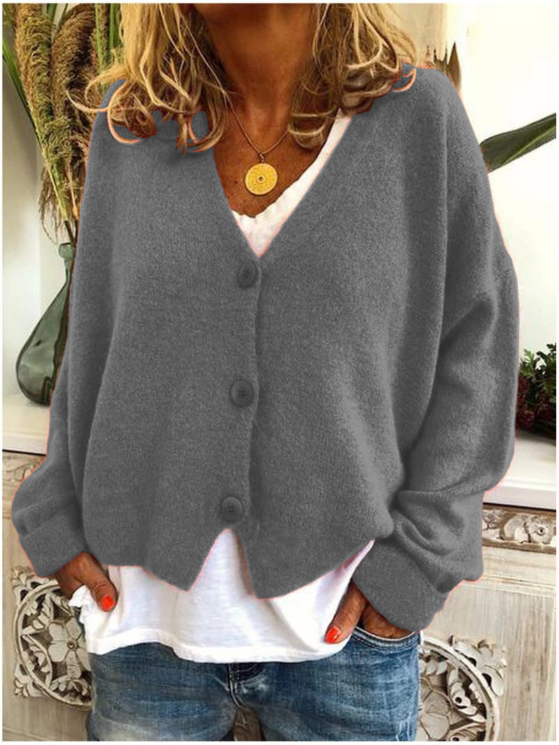 Soft knit women's V-neck button front cardigan, essential for cozy comfort & fashion.