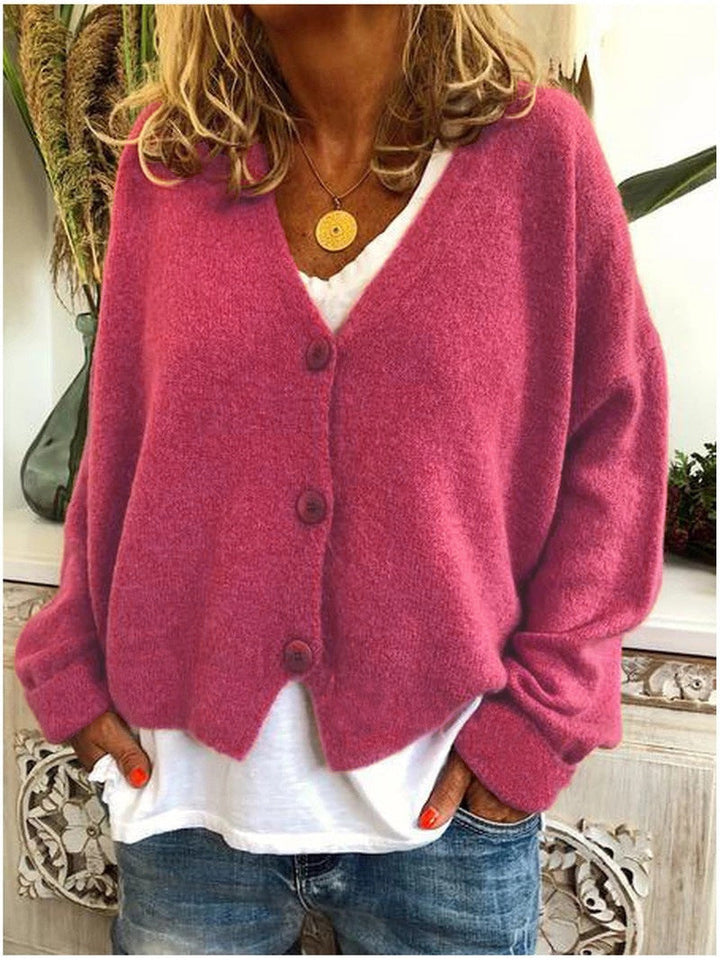 Chic women's V-neck buttoned cardigan, designed for a comfortable, stylish layered look.