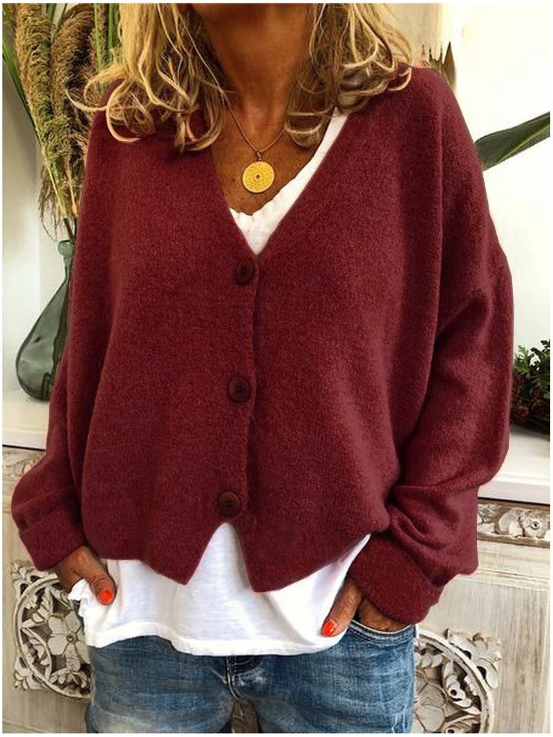 Fashionable women's cropped V-neck cardigan with buttons, an ideal versatile top.