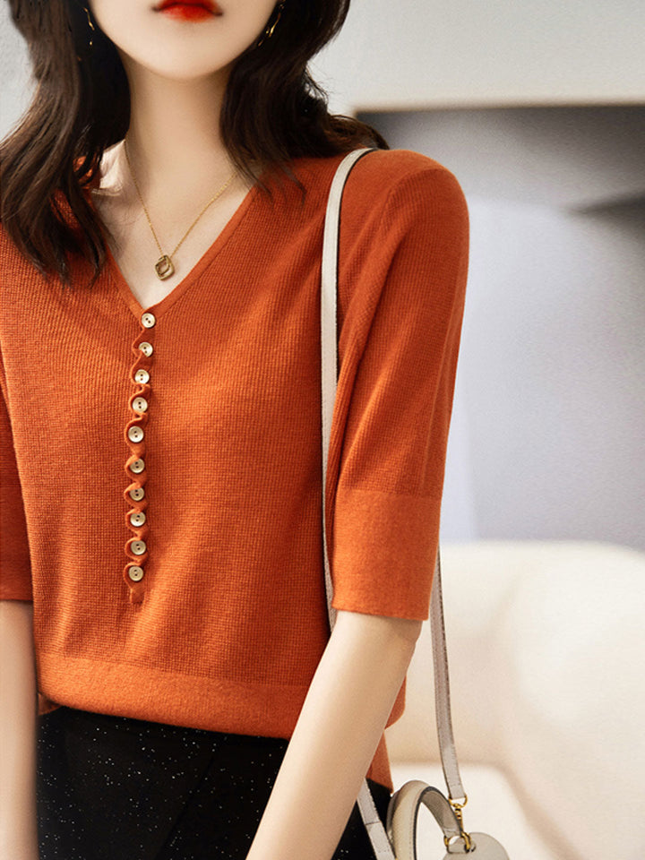 Stylish women's V-neck buttoned knitted top. Perfect for casual, versatile, and comfortable everyday fashion.