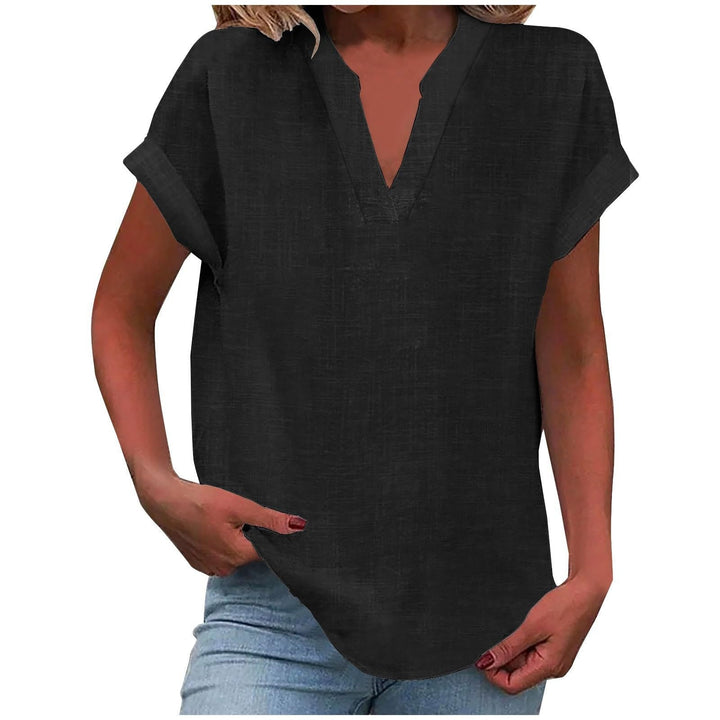 Stylish women's top: V-neck, cap sleeves, textured fabric, & a unique curved hem for casual outfits.