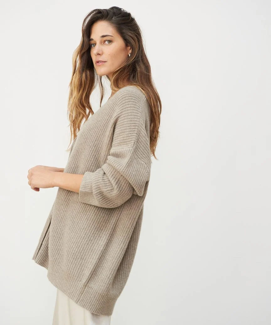 Flattering V-neck cardigan for women, an elegant and comfortable layering sweater.