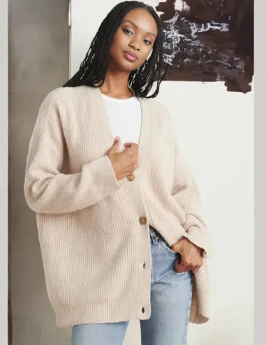 Cozy women's V-neck cardigan, warm and comfortable knitwear sweater for layering.